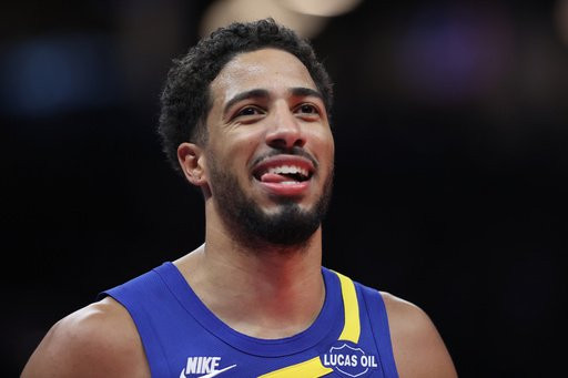 Indiana Pacers' Tyrese Haliburton smiles during the second half of an NBA basketball game against the Brooklyn Nets Sunday, Oct. 25, 2026, in New York. (AP Photo/Pamela Smith)