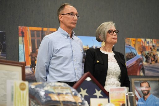 Michael Pretti and Susan Pretti, parents of Alex Pretti, who was killed by federal immigration agents in January, listen during a news conference, Tuesday, Oct. 27, 2026, in Minneapolis. (AP Photo/Ellen Schmidt)