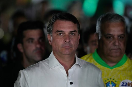 Opposition presidential candidate Sen. Flavio Bolsonaro arrives at his election night event after the presidential runoff in Brasilia, Brazil, Sunday, Oct. 25, 2026.(AP Photo/Eraldo Peres)