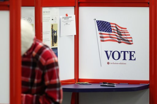 A voter fills out a ballot in the general election during early voting at the Hamilton County Board of Elections, Friday, Oct. 9, 2026, in Norwood, Ohio. (Samuel Corum/Pool Photo via AP)