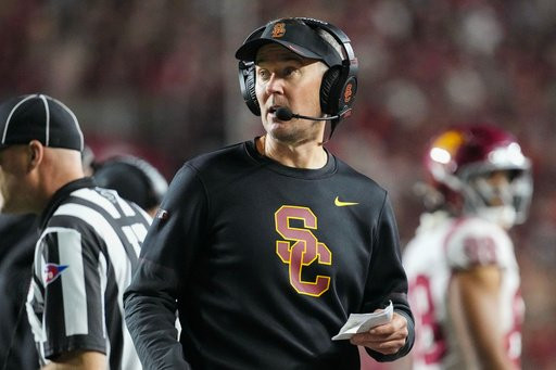 Southern California head coach Lincoln Riley looks toward the field during an NCAA college football game against Wisconsin, Saturday, Oct. 24, 2026, in Madison, Wis. (AP Photo/Ross Harried)
