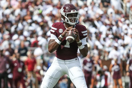 Mississippi State quarterback Kamario Taylor (1) looks downfield against Alabama during the first half of an NCAA college football game in Starkville, Miss., Saturday, Oct. 3, 2026. (AP Photo/James Pugh)