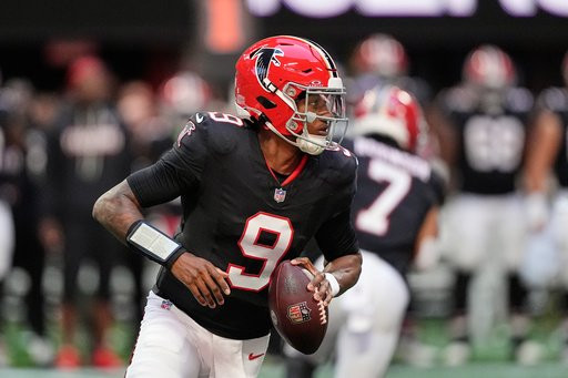 Atlanta Falcons quarterback Michael Penix Jr. (9) runs the ball during the first half of an NFL football game against the San Francisco 49ers in Atlanta, Sunday, Oct. 25, 2026. (AP Photo/Brynn Anderson)
