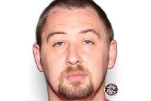 Police find a car they say was driven by the man wanted in the death of 4 Tennessee family members