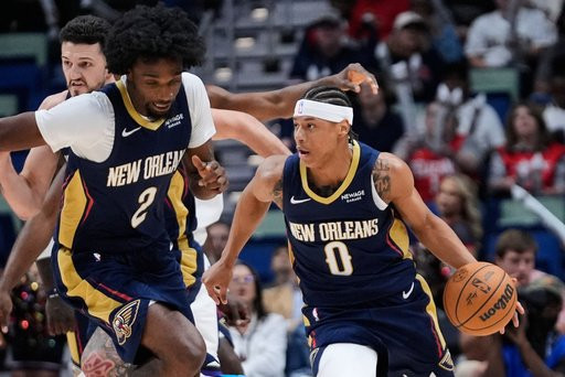 New Orleans Pelicans guard Jeremiah Fears (0) drives down court against the Sacramento Kings in the first half of an NBA basketball game, Thursday, Oct. 29, 2026, in New Orleans. (AP Photo/Gerald Herbert)