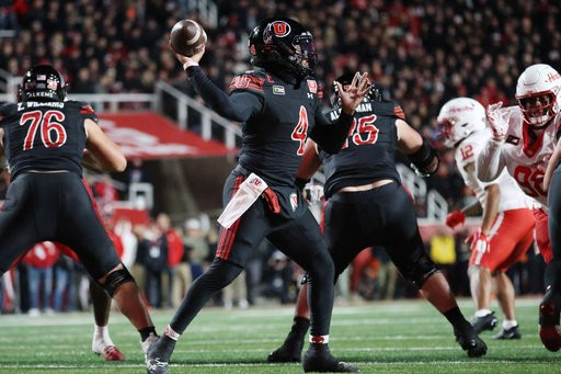 Utah quarterback Devon Dampier throws against Houston during an NCAA college football game Saturday, Oct. 24, 2026, in Salt Lake City. (AP Photo/Jeffrey D. Allred)