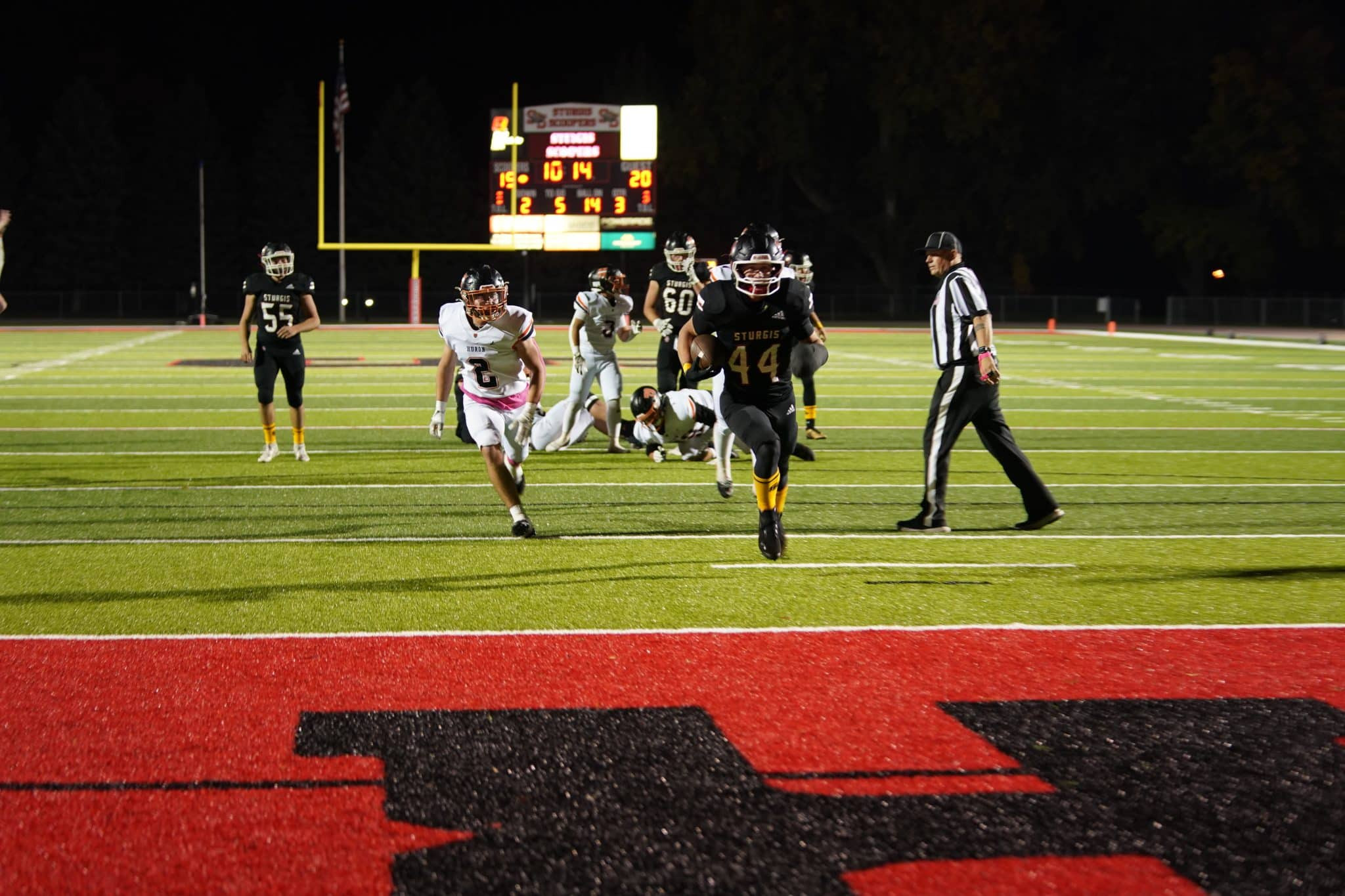 Scooper football powers past Huron in high-scoring affair
