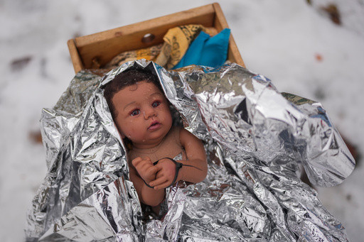 Church nativity scenes add zip ties, gas masks and ICE to protest immigration raids