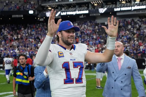 Buffalo Bills quarterback Josh Allen (17) celebrates after the team's win over the Las Vegas Raiders in an NFL football game in Las Vegas, Sunday, Oct. 18, 2026. (AP Photo/John Locher)