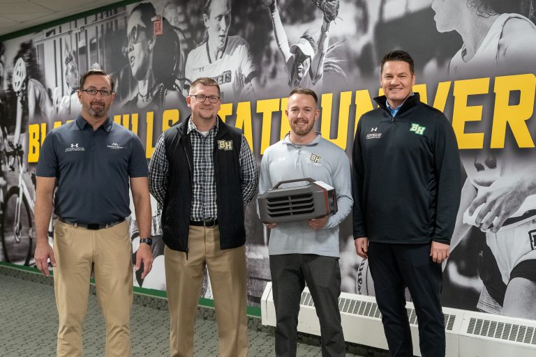 (left to right) Justin Feeser, Manager at Monument Health Northern Hills Rehabilitation and Sports Medicine Mark Nore, BHSU Director of Athletics, Shaun Skavang, BHSU Head Athletic Trainer, Thomas Worsley Monument Health President Spearfish & Hills Market