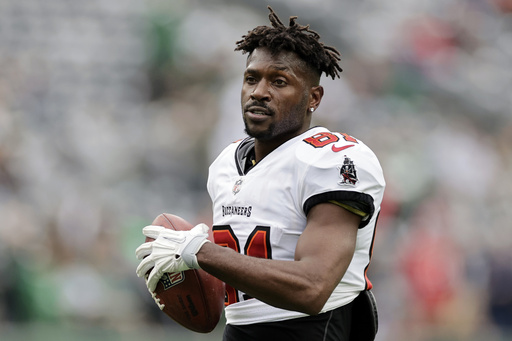 FILE - Tampa Bay Buccaneers wide receiver Antonio Brown (81) walks on the field during an NFL football game against the New York Jets, Sunday, Jan. 2, 2022, in East Rutherford, N.J. (AP Photo/Adam Hunger, File)
