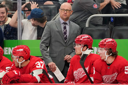 FILE - Detroit Red Wings head coach Jeff Blashill watches during the third period of an NHL preseason hockey game against the Chicago Blackhawks, Monday, Oct. 4, 2021, in Detroit. (AP Photo/Paul Sancya, File)