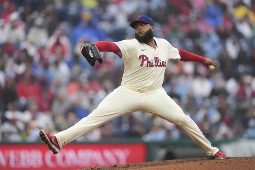 Philadelphia Phillies' José Alvarado pitches during the eighth inning in the first baseball game of a doubleheader against the St. Louis Cardinals Wednesday, May 14, 2025, in Philadelphia. (AP Photo/Matt Slocum)