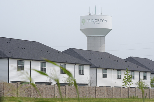 A water tower bears the name of the town, Princeton, Texas, Friday, May 16, 2025. (AP Photo/LM Otero)
