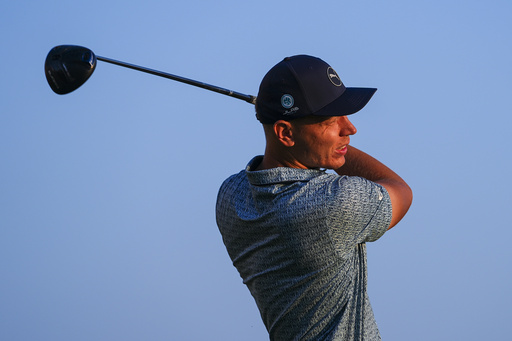 Matti Schmid watches his shot off the first tee during the first round of the Charles Schwab Challenge golf tournament at Colonial Country Club in Fort Worth, Texas, Thursday, May 22, 2025. (AP Photo/Julio Cortez)