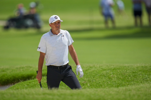 Jordan Spieth prepares to hit an approach shot on the sixth hole during the final round of the Charles Schwab Challenge golf tournament at Colonial Country Club in Fort Worth, Texas, Sunday, May 25, 2025. (AP Photo/Julio Cortez)
