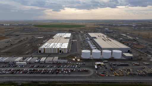 Construction is seen at an Amazon Web Services data center on Aug. 22, 2024, in Boardman, Ore. (AP Photo/Jenny Kane)