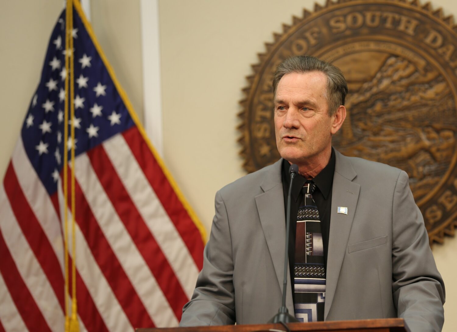 South Dakota Gov. Larry Rhoden speaks to reporters during a press conference on March 31, 2025, at the state Capitol in Pierre. (Joshua Haiar/South Dakota Searchlight)