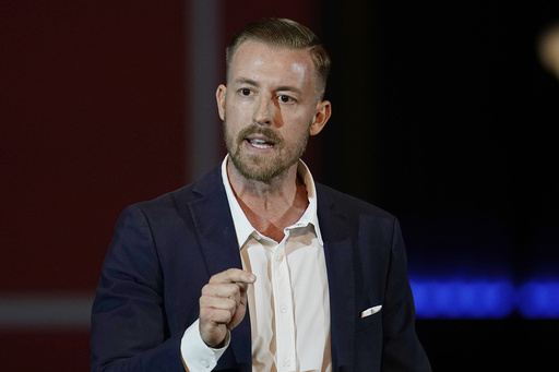 FILE - Ryan Walters, Republican candidate for Oklahoma State Superintendent, speaks at a rally, Nov. 1, 2022, in Oklahoma City. (AP Photo/Sue Ogrocki, File)