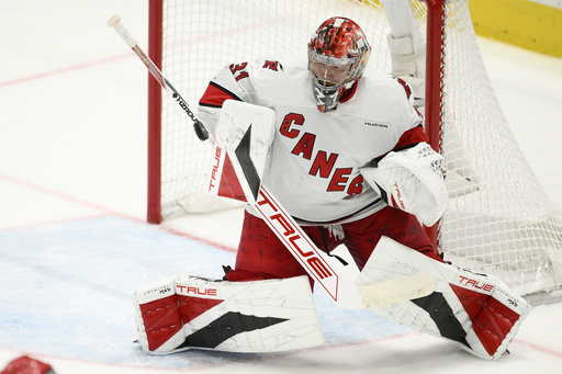 Carolina Hurricanes goaltender Frederik Andersen (31) stops the puck in the third period of Game 5 of a second-round NHL hockey playoff series against the Washington Capitals Thursday, May 15, 2025, in Washington. (AP Photo/Nick Wass)