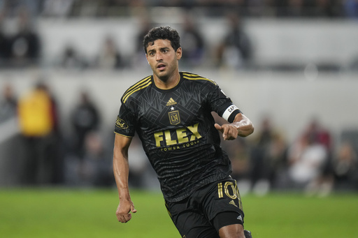 FILE - Los Angeles FC forward Carlos Vela chases the ball during the second half of an MLS soccer match against the Real Salt Lake on Oct. 1, 2023, in Los Angeles. (AP Photo/Jae C. Hong, File)