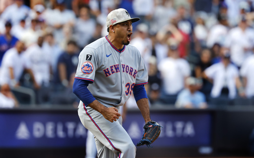 New York Mets pitcher Edwin Díaz (39) reacts after striking out New York Yankees' Aaron Judge to close out the ninth inning of a baseball game, Saturday, May 17, 2025, in New York. (AP Photo/Noah K. Murray)