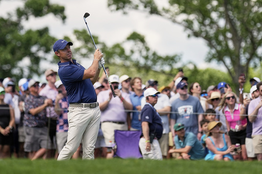 Rory McIlroy, of Northern Ireland, watches his tee shot on the 17th hole during the third round of the PGA Championship golf tournament at the Quail Hollow Club, Saturday, May 17, 2025, in Charlotte, N.C. (AP Photo/George Walker IV)