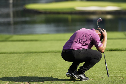 Tyrrell Hatton, of England, reacts to his tee shot on the 17th hole during the first round of the PGA Championship golf tournament at the Quail Hollow Club, Thursday, May 15, 2025, in Charlotte, N.C. (AP Photo/David J. Phillip)
