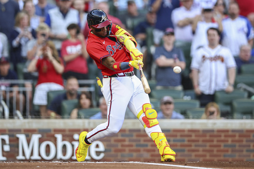 Atlanta Braves' Ronald Acuna Jr. hits a home run in the first inning of a baseball game against the San Diego Padres, Friday, May 23, 2025, in Atlanta. (AP Photo/Colin Hubbard)
