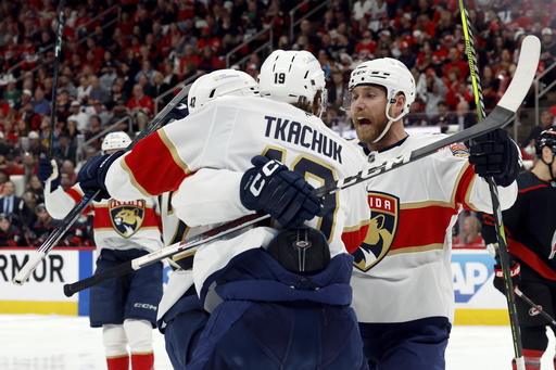 The Florida Panthers celebrate a goal by Gustav Forsling (42) during the first period of Game 2 of the NHL hockey Stanley Cup Eastern Conference finals against the Carolina Hurricanes in Raleigh, N.C., Thursday, May 22, 2025. (AP Photo/Karl DeBlaker)