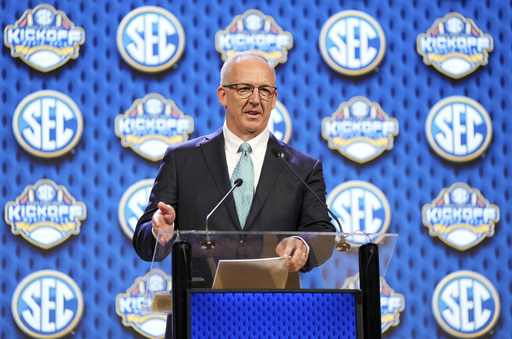 FILE - Southeastern Conference commissioner Greg Sankey speaks during SEC NCAA college football media days, July 15, 2024, in Dallas. (AP Photo/Jeffrey McWhorter, File)