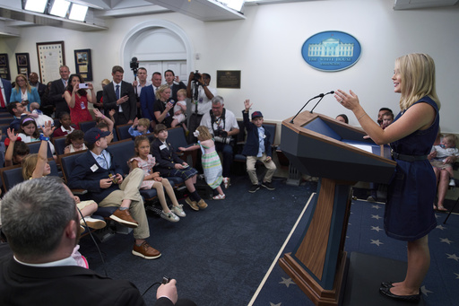 White House press secretary Karoline Leavitt speaks with children during a briefing for children during a Take Our Daughters and Sons to Work Day in the James Brady Press Briefing Room at the White House, Tuesday, May 20, 2025, in Washington. (AP Photo/Evan Vucci)