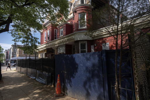 A building, currently vacant and under heavy renovation, at an address associated with a contribution to President Donald Trump, is photographed May 2, 2025, in Washington. (AP Photo/Mark Schiefelbein)