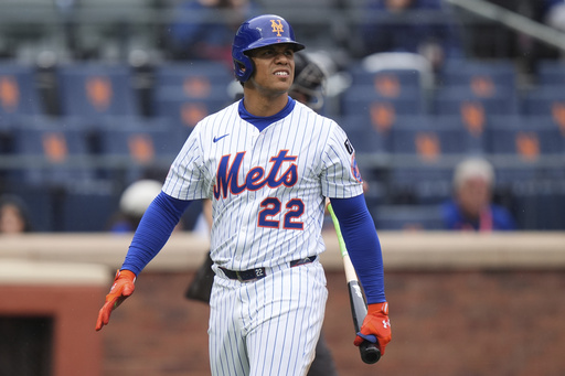New York Mets' Juan Soto (22) reacts after striking out during the fifth inning of a baseball game against the Chicago White Sox Wednesday, May 28, 2025, in New York. (AP Photo/Frank Franklin II)