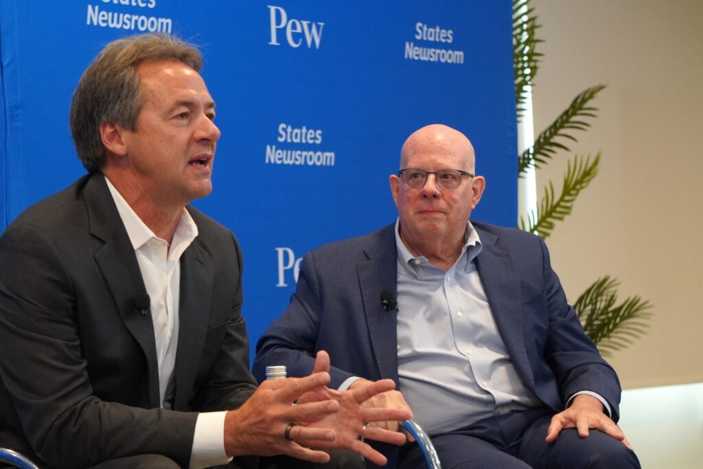 Former Gov. Steve Bullock, D-Montana, (left) and former Gov. Larry Hogan, R-Maryland, (right) said that current governors may be missing an opportunity to have a bigger role in national issues that seem relegated to Congress and the White House if they were able to come together. (Photos by Danielle Brown/Maryland Matters)
