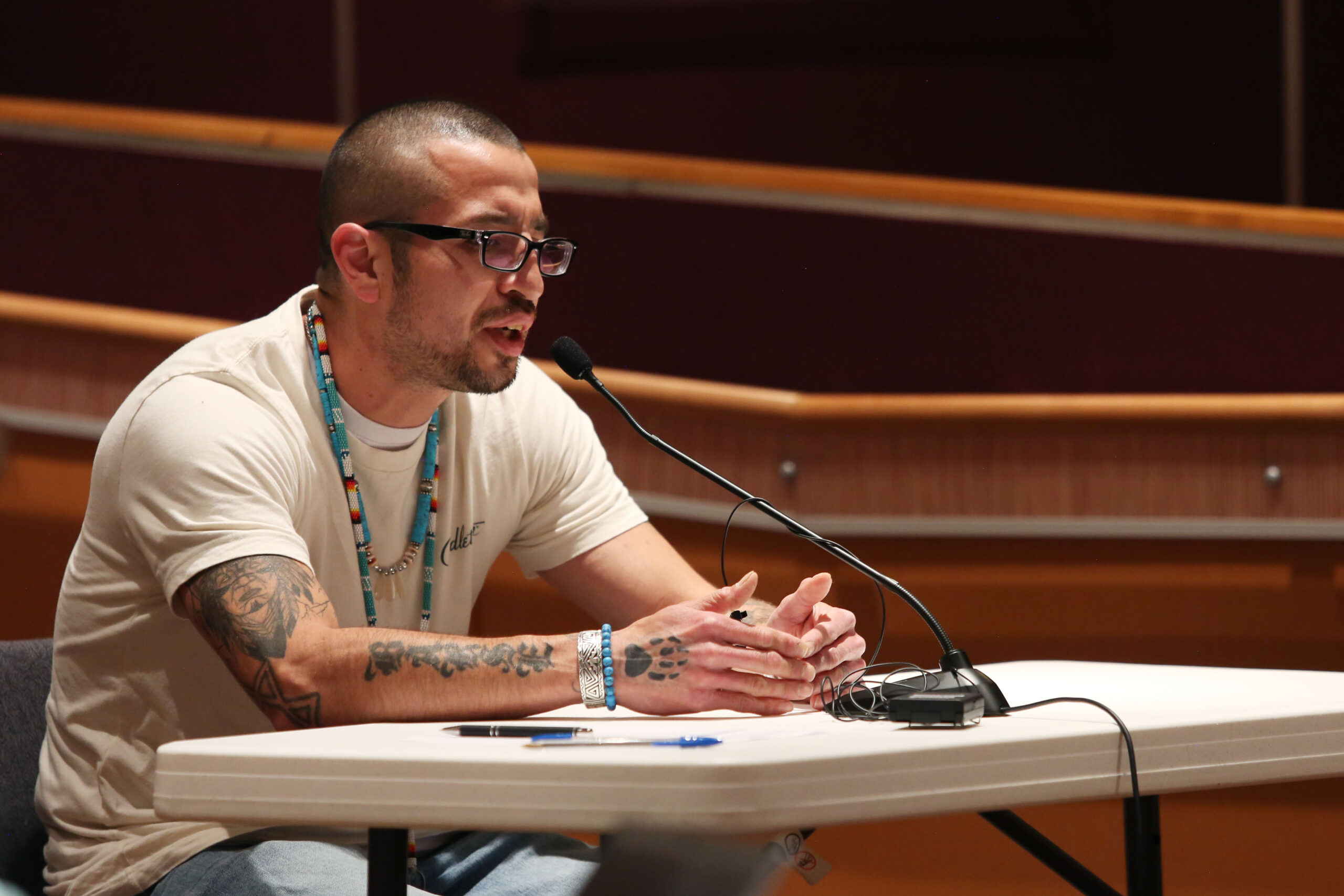 Tracii Barse, a Native American business owner and former inmate, speaks to lawmakers at an Initial Incarceration, Reentry Analysis, and Comparison of Relevant States Interim Committee meeting in Sioux Falls on June 24, 2025. (Makenzie Huber/South Dakota Searchlight)