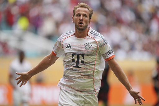Bayern Munich's Harry Kane celebrates after scoring his side's second goal against Flamengo during the Club World Cup round of 16 soccer match between CR Flamengo and Bayern Munich in Miami Gardens, Fla., Sunday, June 29, 2025. (AP Photo/Rebecca Blackwell)