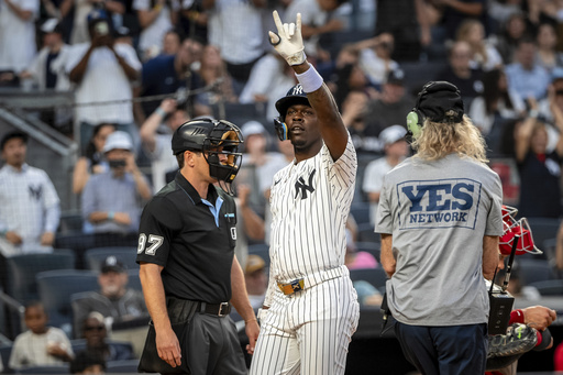 New York Yankees' Jazz Chisholm Jr. (13) celebrates a home run during the second inning of a baseball game against the Los Angeles Angels, Wednesday, June 18, 2025, in New York. (AP Photo/Angelina Katsanis)