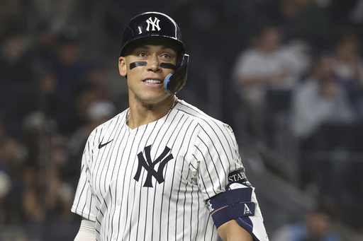 New York Yankees' Aaron Judge walks to the dugout after striking out during the sixth inning of a baseball game against the Los Angeles Angels, Tuesday, June 17, 2025, in New York. (AP Photo/Pamela Smith)