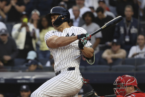New York Yankees' Giancarlo Stanton bats during the first inning of a baseball game against the Los Angeles Angels, Monday, June 16, 2025, in New York. (AP Photo/Pamela Smith)