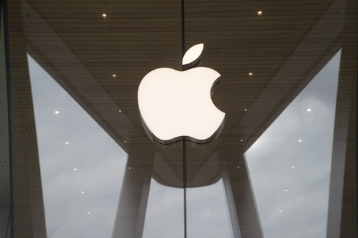 FILE - The Apple logo is displayed at an Apple store, Jan. 3, 2019. (AP Photo/Mary Altaffer, File)