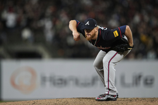 Atlanta Braves pitcher Craig Kimbrel crouches on the mound between pitches during the seventh inning of a baseball game against the San Francisco Giants, Friday, June 6, 2025, in San Francisco. (AP Photo/Godofredo A. Vásquez)