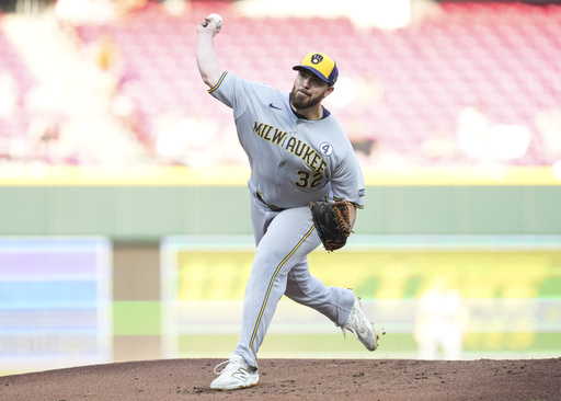 Milwaukee Brewers pitcher Aaron Civale throws during the first inning of a baseball game against the Cincinnati Reds, Monday, June 2, 2025, in Cincinnati. (AP Photo/Jeff Dean)