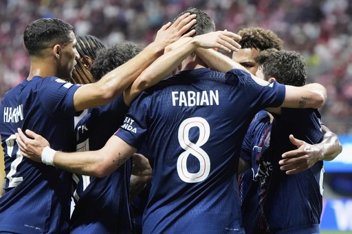Paris Saint-Germain team celebrates the second goal by Paris Saint-Germain's Joao Neves during the Club World Cup round of 16 soccer match between PSG and Inter Miami in Atlanta, Sunday, June 29, 2025. (AP Photo/Mike Stewart)