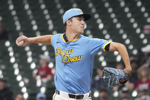 Milwaukee Brewers pitcher Jacob Misiorowski throws against St. Louis Cardinals' Lars Nootbaar as he makes his major league debut during the first inning of a baseball game Thursday, June 12, 2025, in Milwaukee. (AP Photo/Kayla Wolf)