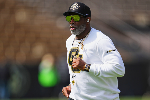 FILE - Colorado head coach Deion Sanders takes the field during an NCAA college football spring game, Saturday, April 19, 2025, in Boulder, Colo. (AP PhotoJack Dempsey, File)