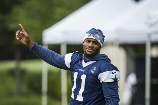 Dallas Cowboys' Micah Parsons smiles during practice at NFL football minicamp, Tuesday, June 10, 2025, in Frisco, Texas. (AP Photo/Jessica Tobias)