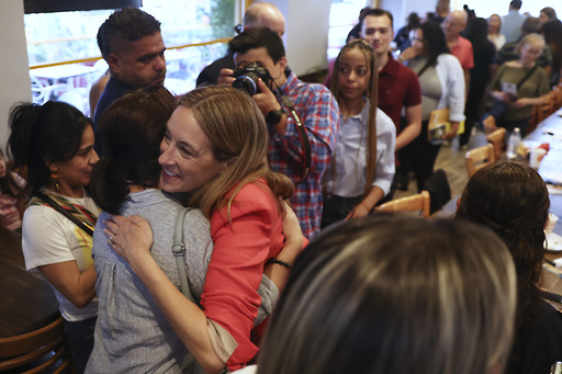 Rep. Mikie Sherrill, D-N.J., greets people during a "Get Out the Vote" rally, Saturday, June 7, 2025, in Elizabeth, N.J. (AP Photo/Heather Khalifa)