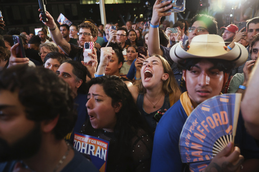 Supporters of Democratic mayoral candidate Zohran Mamdani cheer while he speaks at his primary election party, Wednesday, June 25, 2025, in New York. (AP Photo/Heather Khalifa)