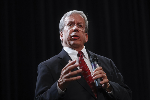 FILE - William O'Neill, former Ohio Supreme Court Justice, speaks during the Ohio Democratic Party's fifth debate in the primary race for governor, Tuesday, April 10, 2018, at Miami (OH) University's Middletown campus in Middletown, Ohio. (AP Photo/John Minchillo, File)